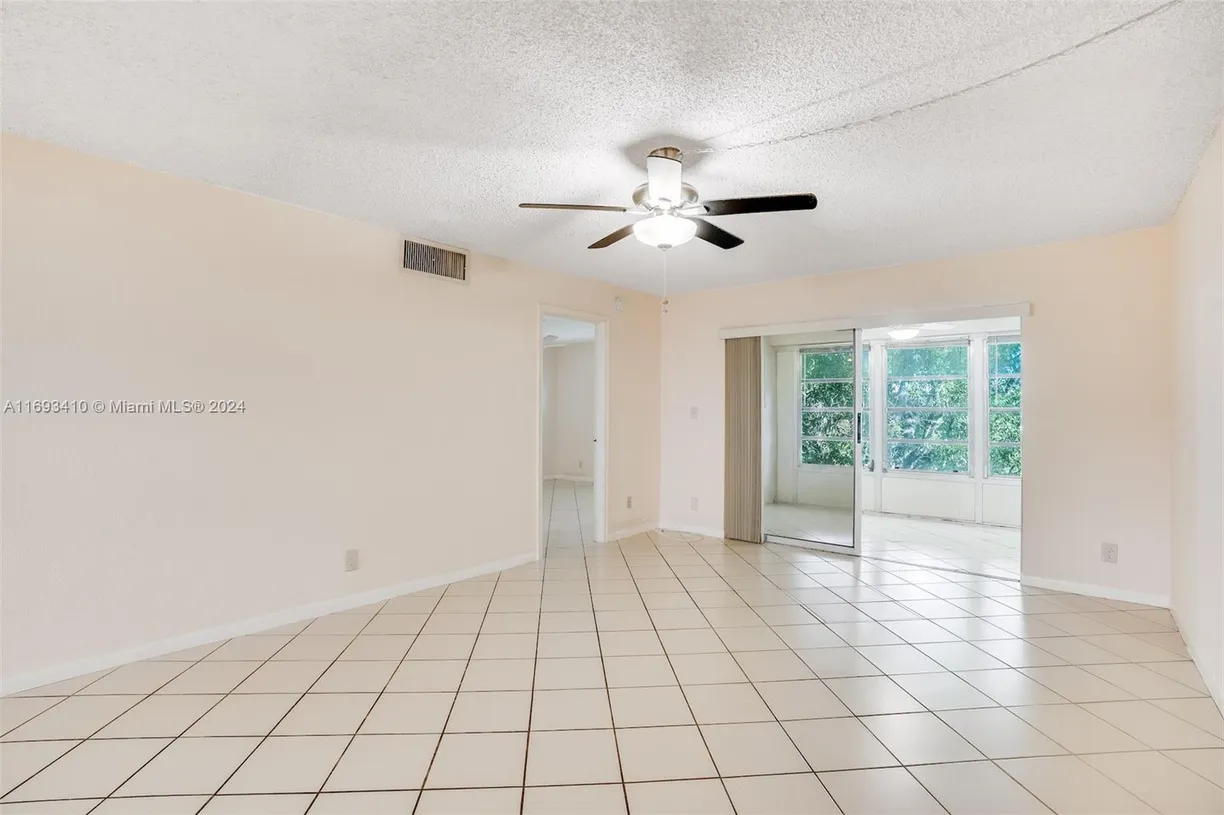 South Florida Real Estate | View 608 SW Natura Blvd, 311 | Listing