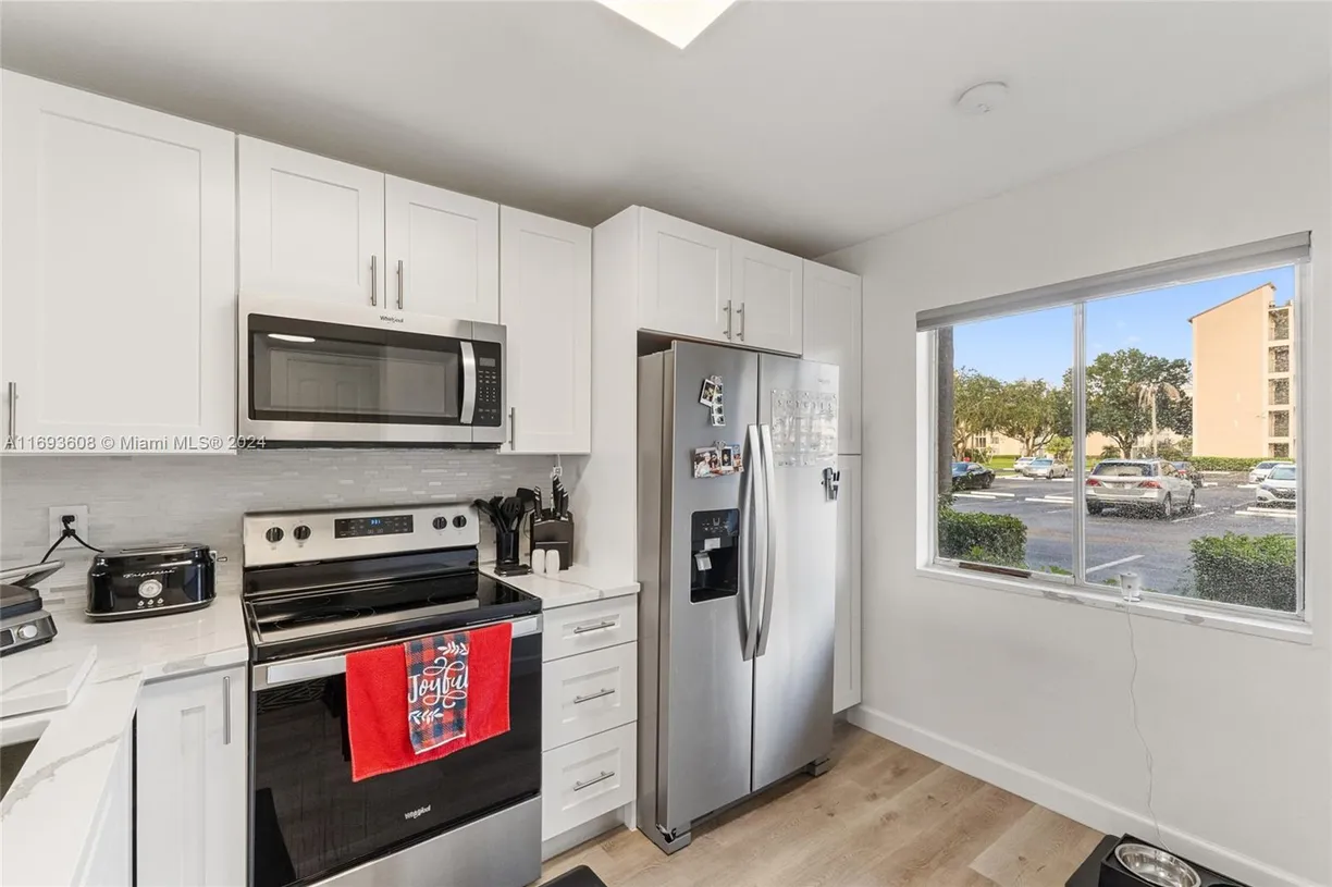 South Florida Real Estate | View 7840 NW 50th St, 109 | 2 Beds, 2 Baths