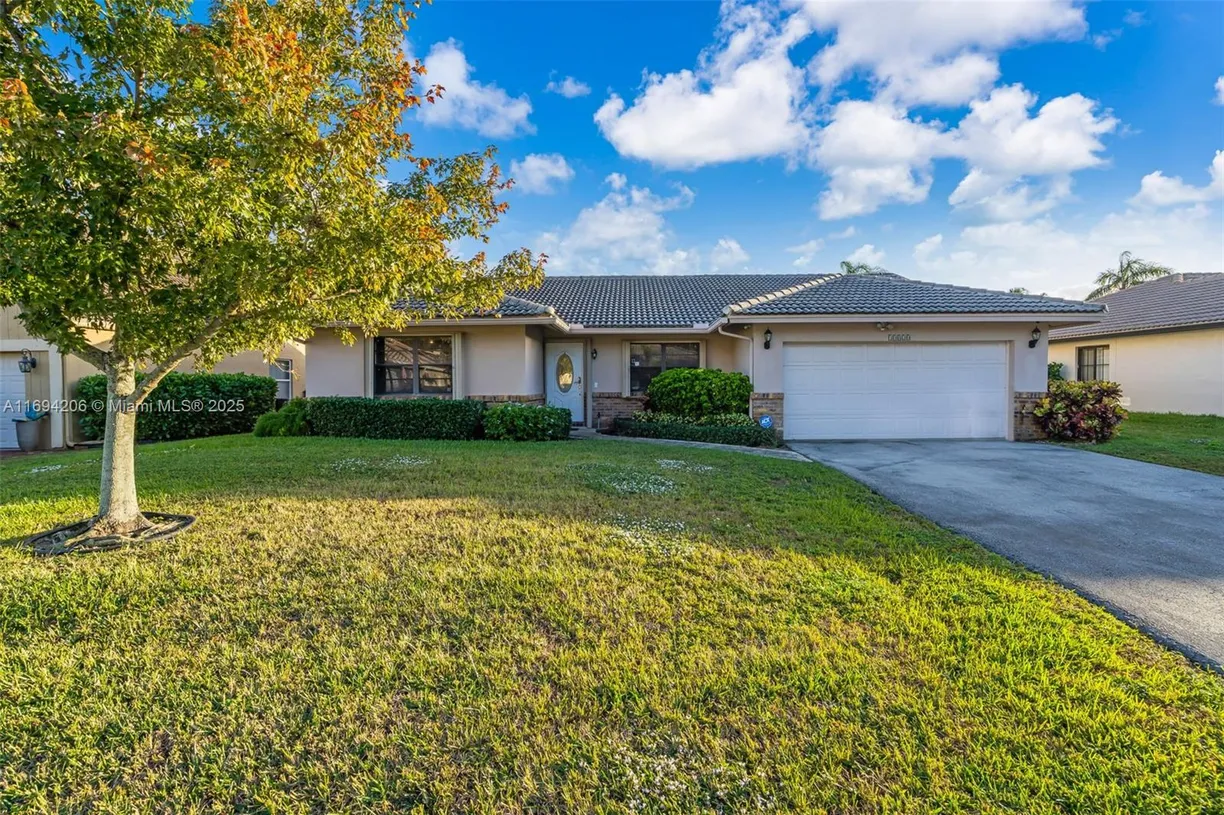 South Florida Real Estate | View 10820 NW 10th Pl | 4 Beds, 2 Baths