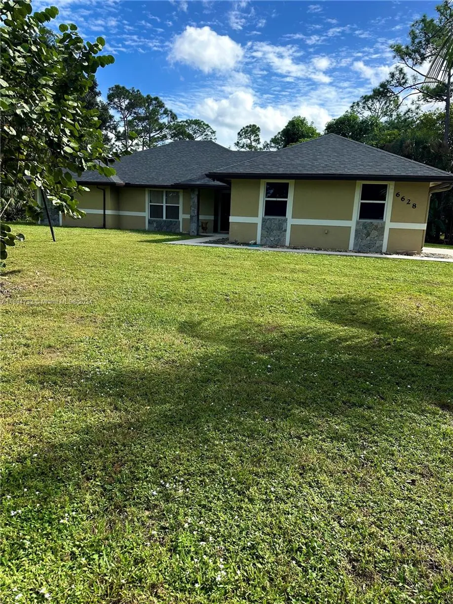 South Florida Real Estate | View 6628 Seminole Pratt Whitney Rd | 3 Beds, 2 Baths