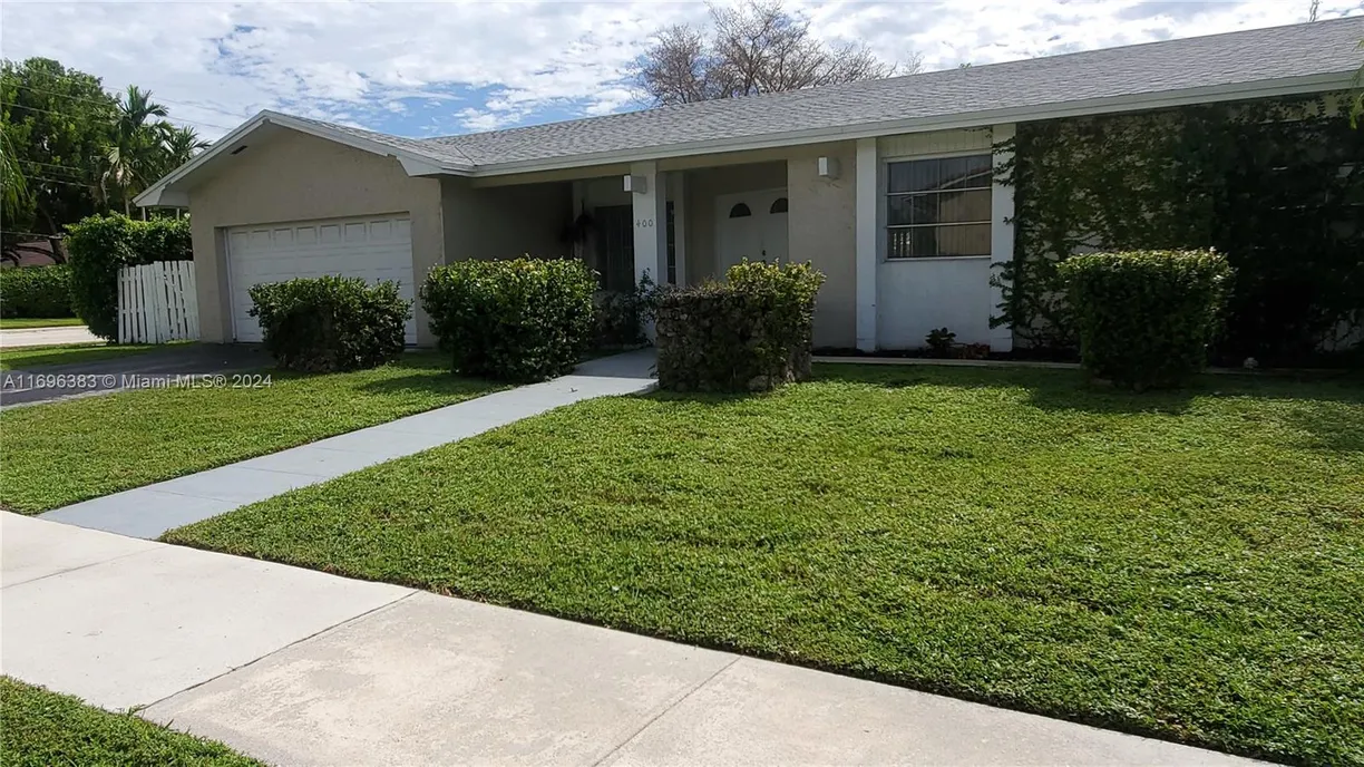 South Florida Real Estate | View 400 Chestnut Ln | 4 Beds, 2 Baths