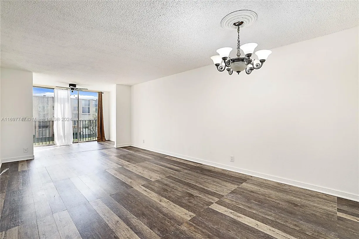 South Florida Real Estate | View 7760 NW 50th St, 305 | Listing