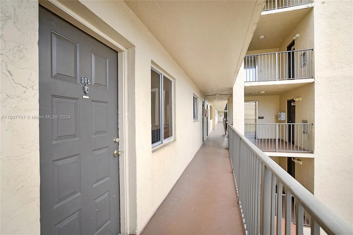 South Florida Real Estate | View 7760 NW 50th St, 305 | Listing
