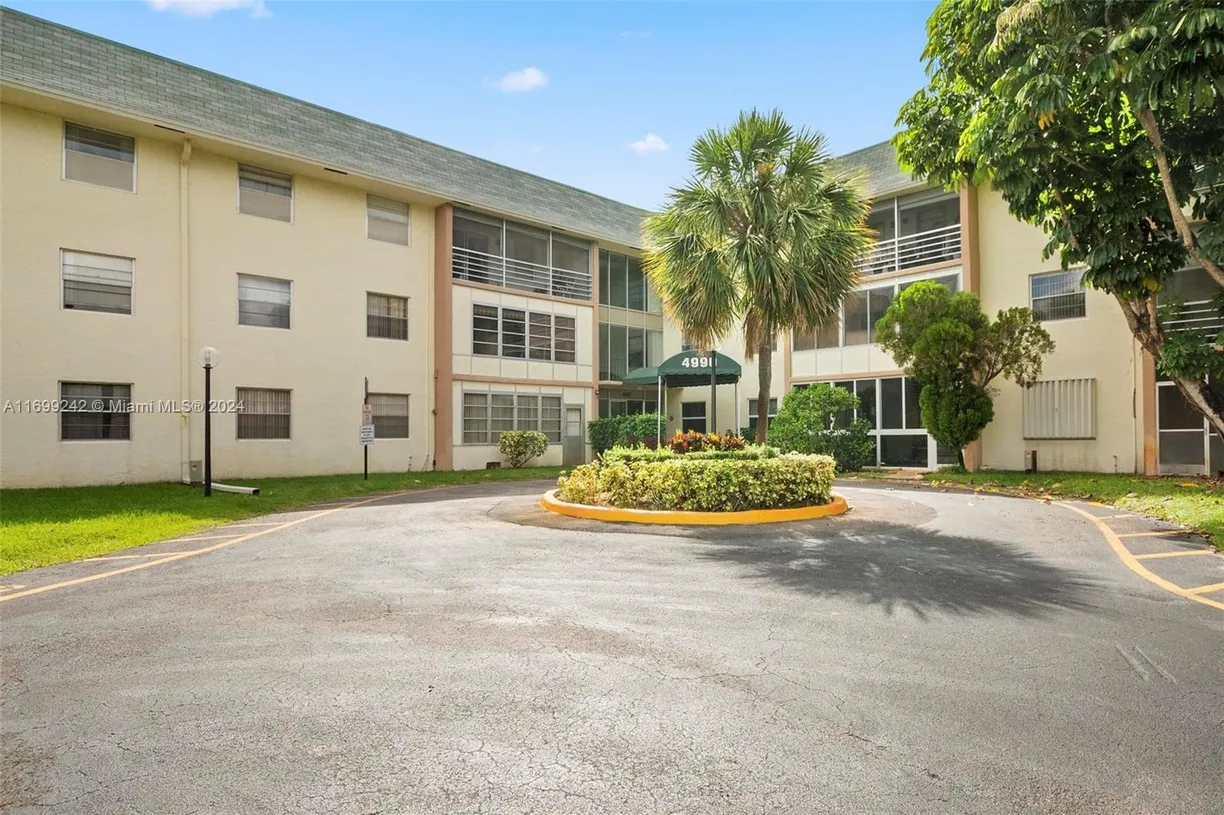 South Florida Real Estate | View 4990 E Sabal Palm Blvd, 320 | 2 Beds, 2 Baths
