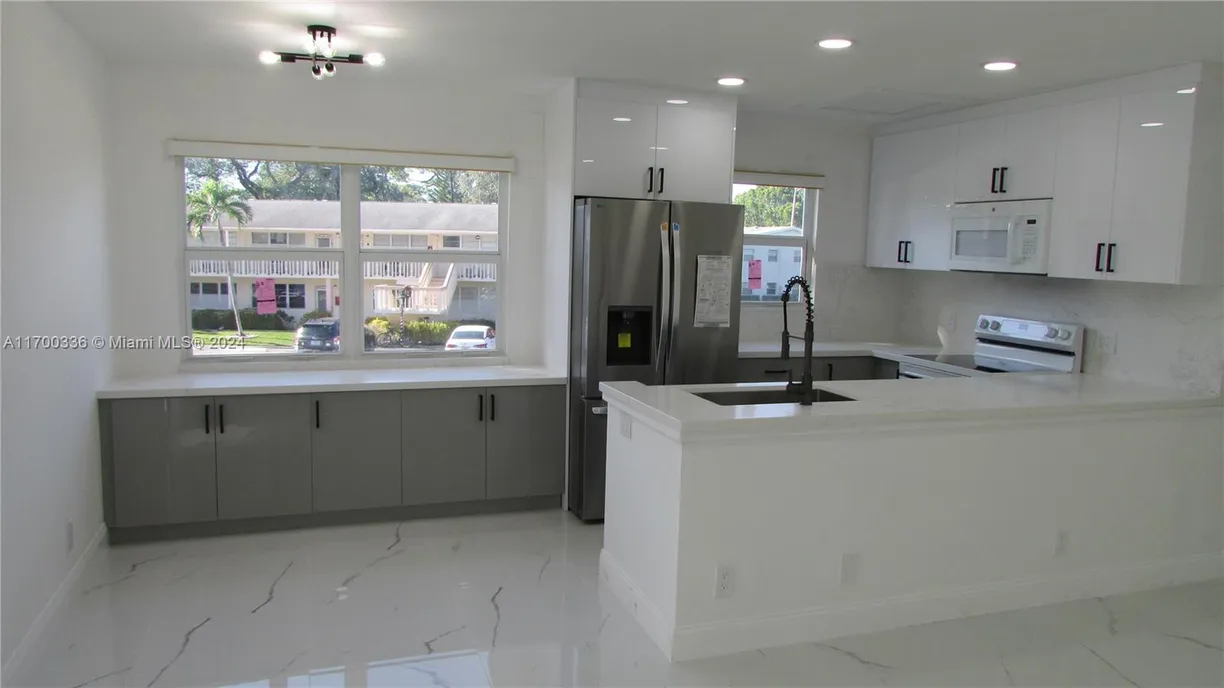 South Florida Real Estate | View 115 Ventnor F, 115 | Listing