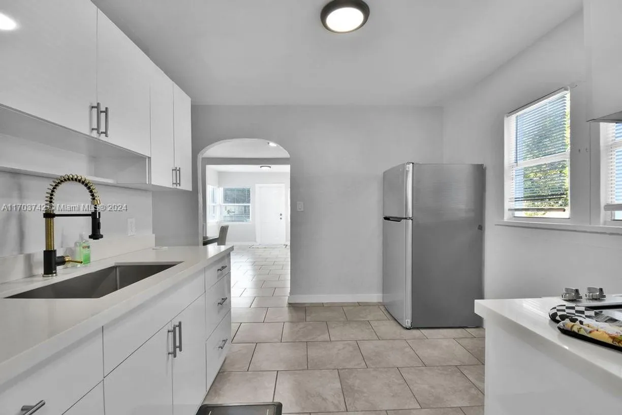 South Florida Real Estate | View 585 NW 51st St | Listing