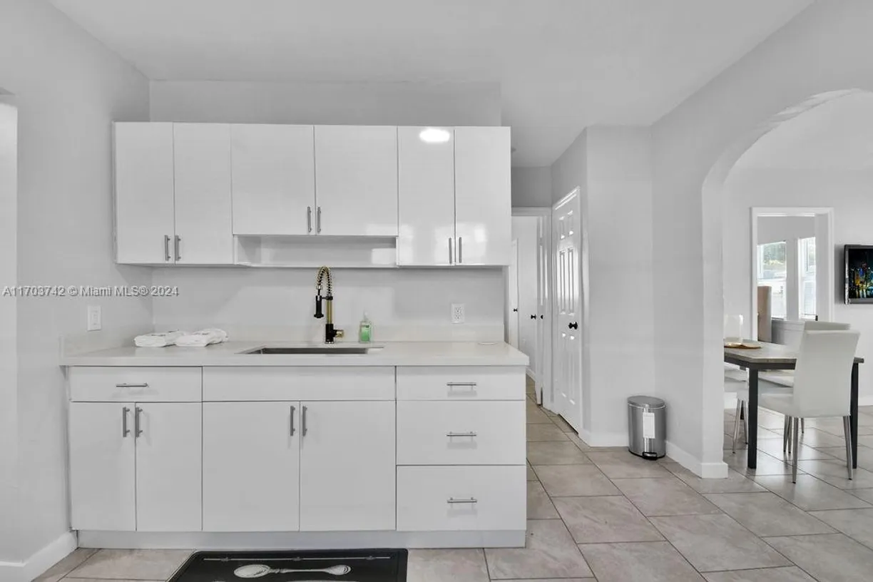 South Florida Real Estate | View 585 NW 51st St | Listing