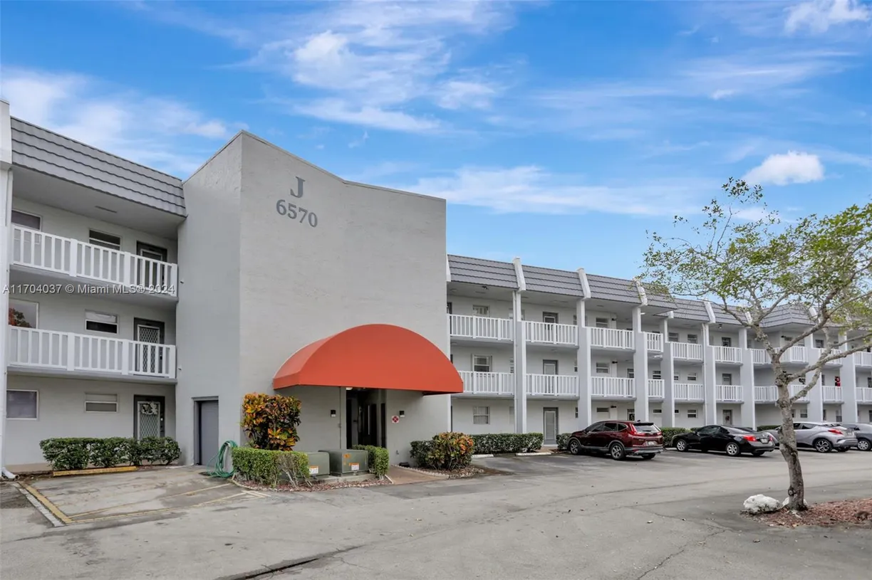 South Florida Real Estate | View 6570 Royal Palm Blvd, 206J | 2 Beds, 2 Baths