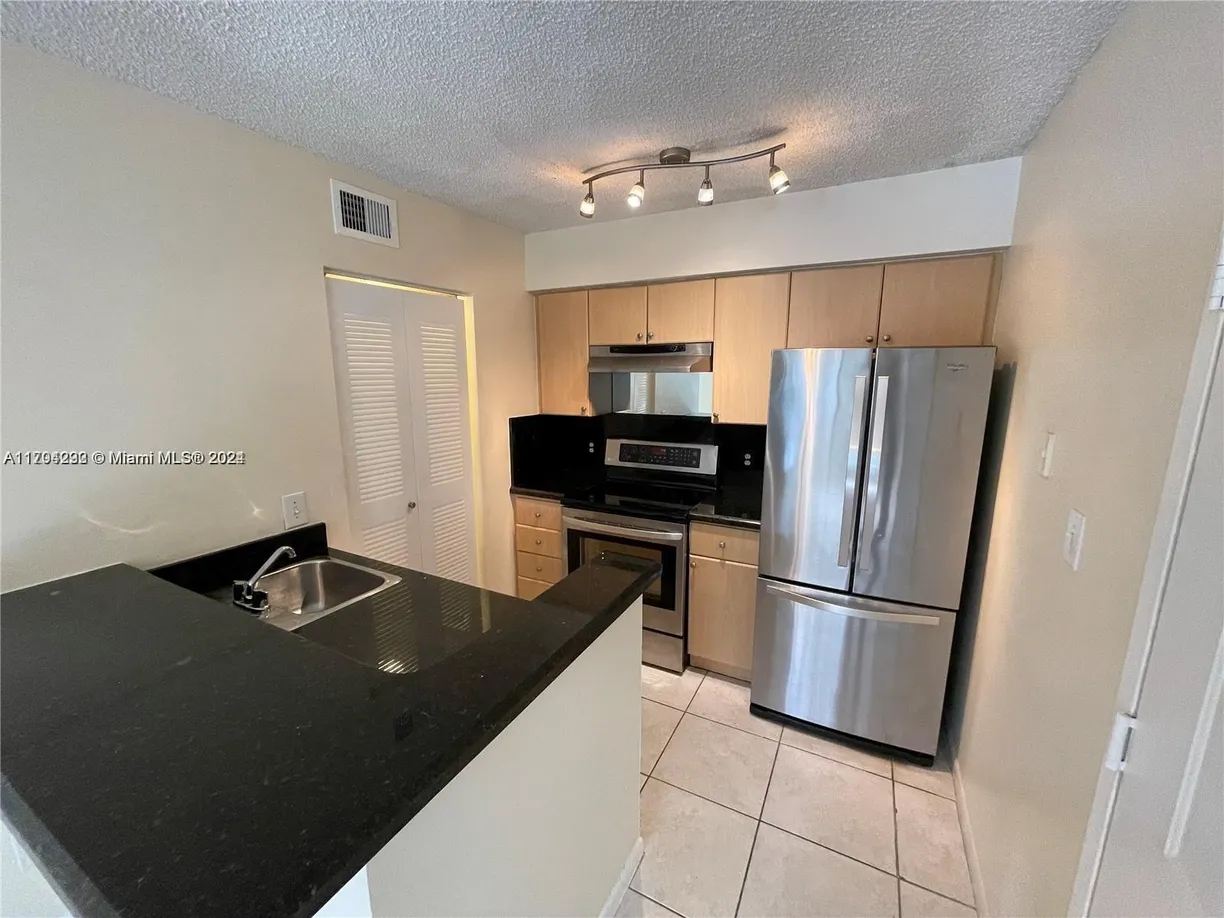 South Florida Real Estate | View 550 S Park Rd, 24-8 | Listing