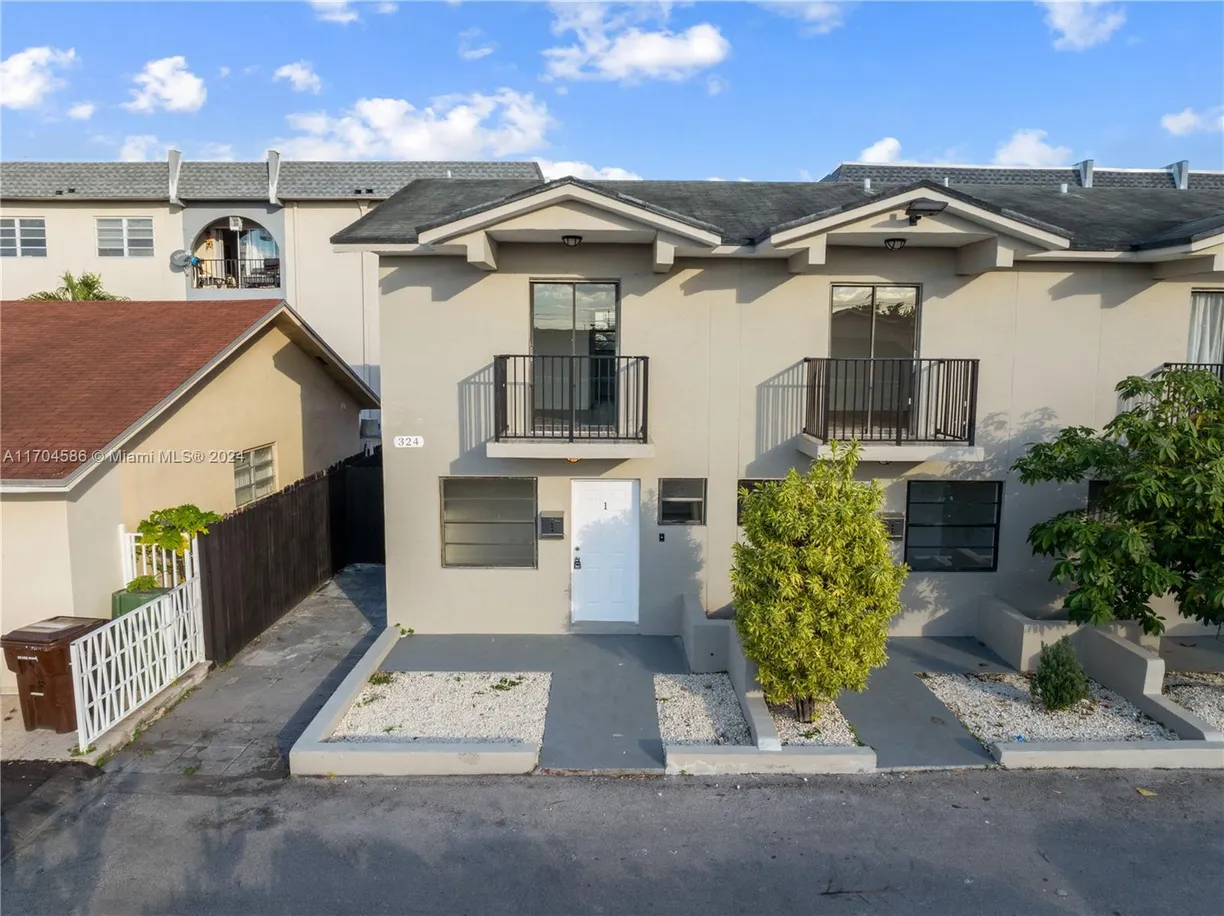 South Florida Real Estate | View 324 W 74th Pl, 5 | 2 Beds, 1 Bath