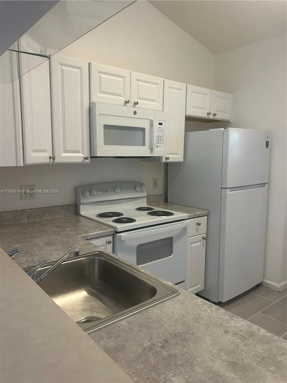 South Florida Real Estate | View 2451 NW 56th Ave, 1-205 | 2 Beds, 2 Baths