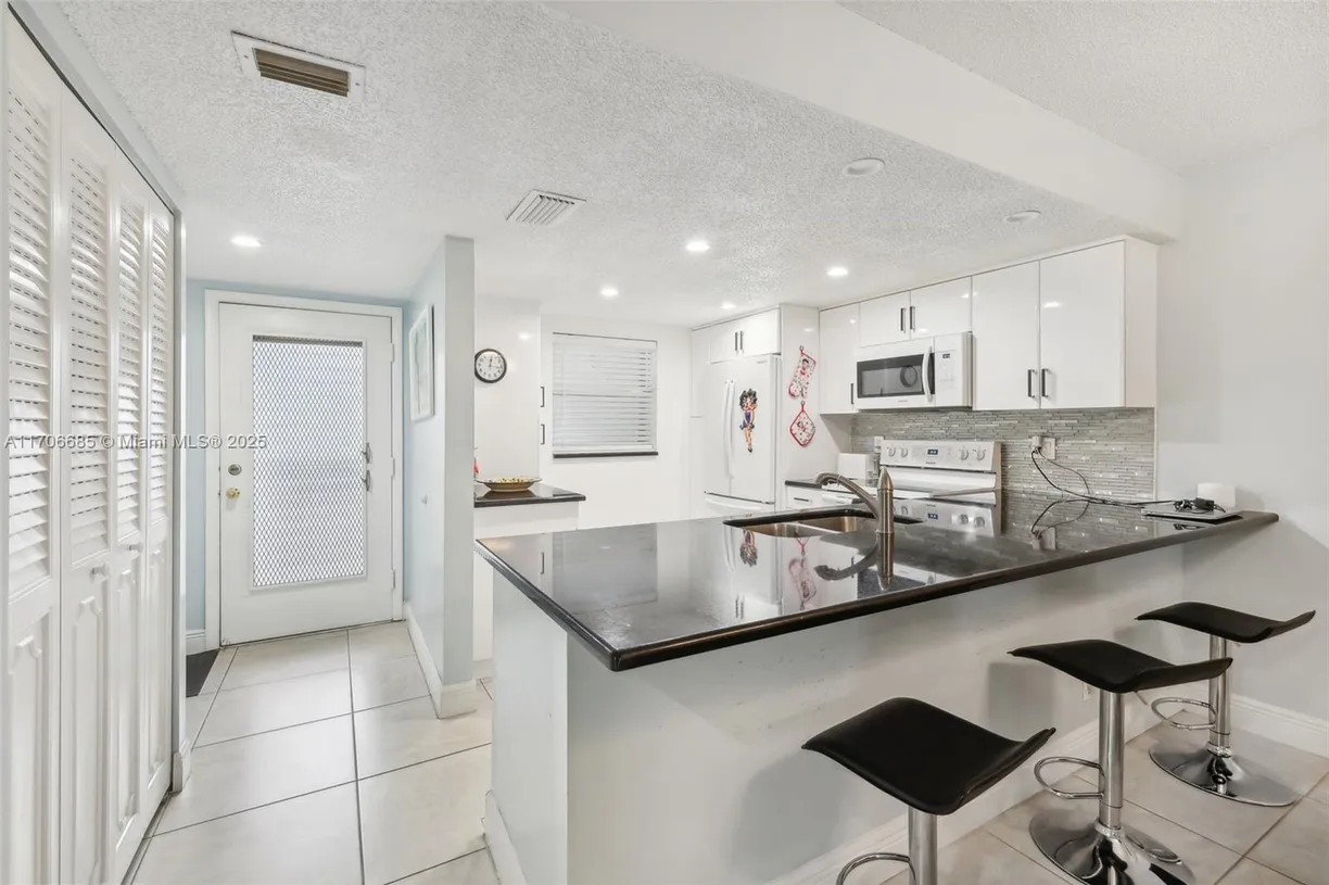 South Florida Real Estate | View 3170 Holiday Springs Blvd, 6-108 | 2 Beds, 2 Baths
