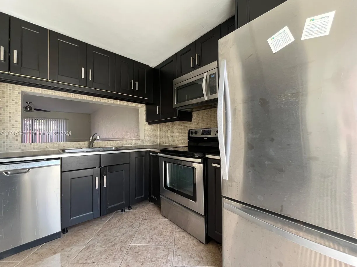 South Florida Real Estate | View 2700 S Oakland Forest Dr, 304 | Listing