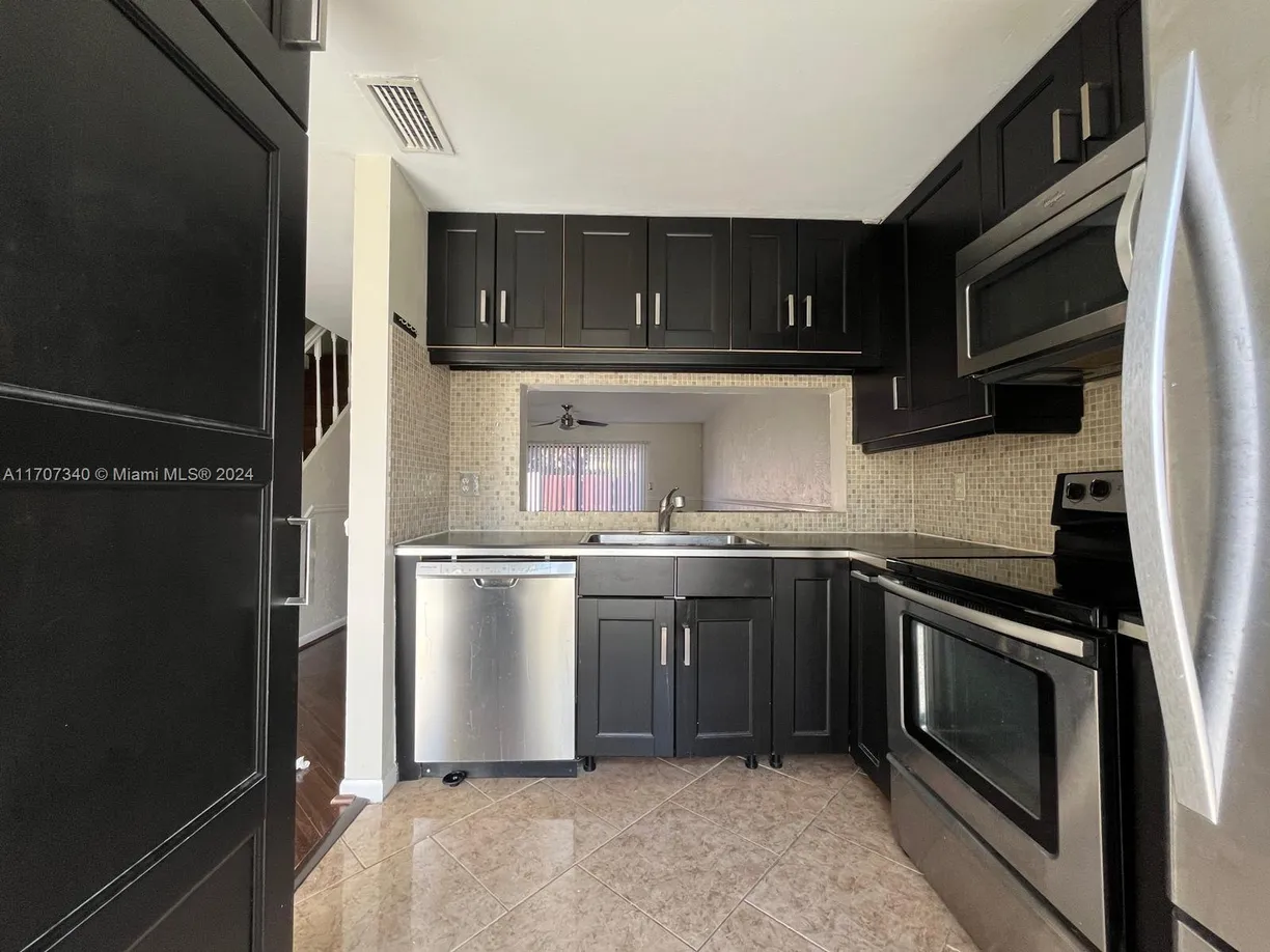 South Florida Real Estate | View 2700 S Oakland Forest Dr, 304 | Listing