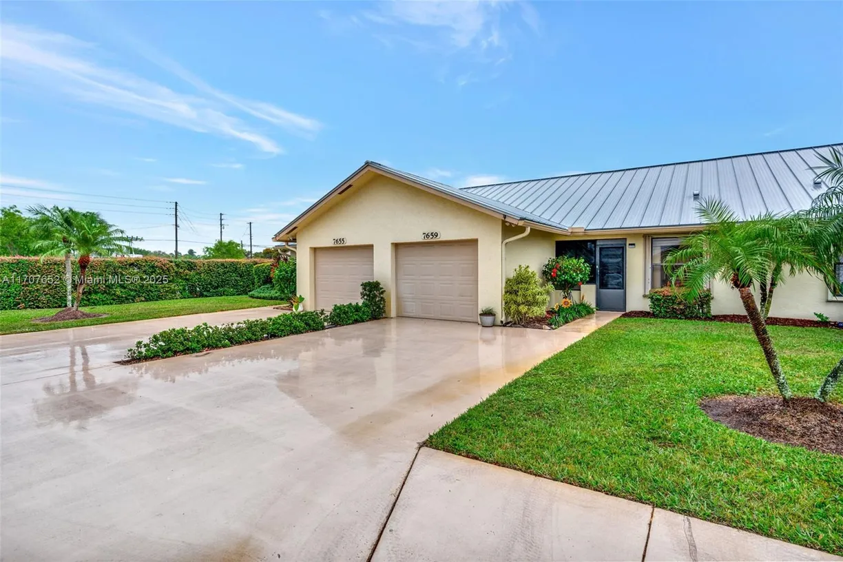 South Florida Real Estate | View 7659 SE Sugar Sand | 2 Beds, 2 Baths