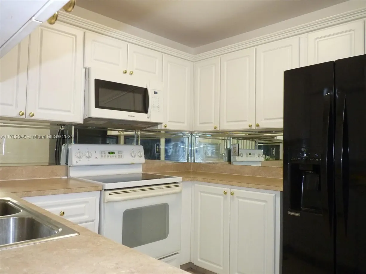 South Florida Real Estate | View 313 SW 1st Ct, L-7 | Listing