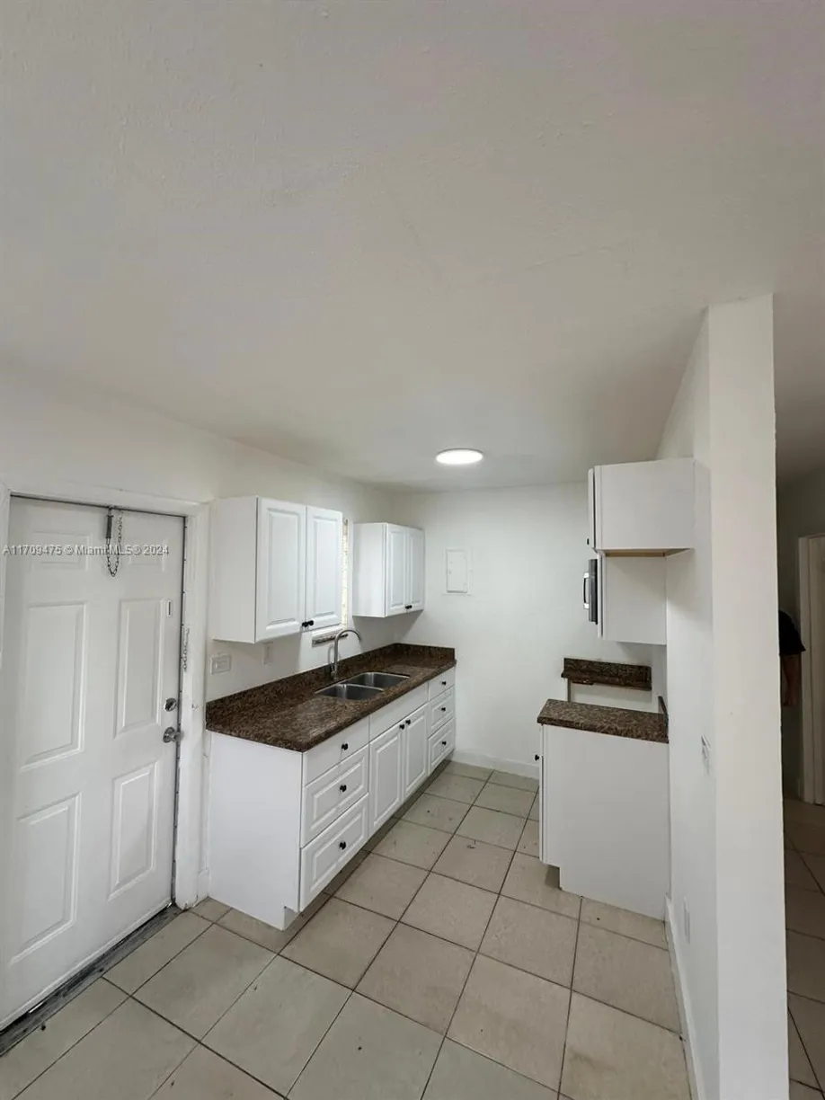South Florida Real Estate | View 940 NW 34th Way | Listing
