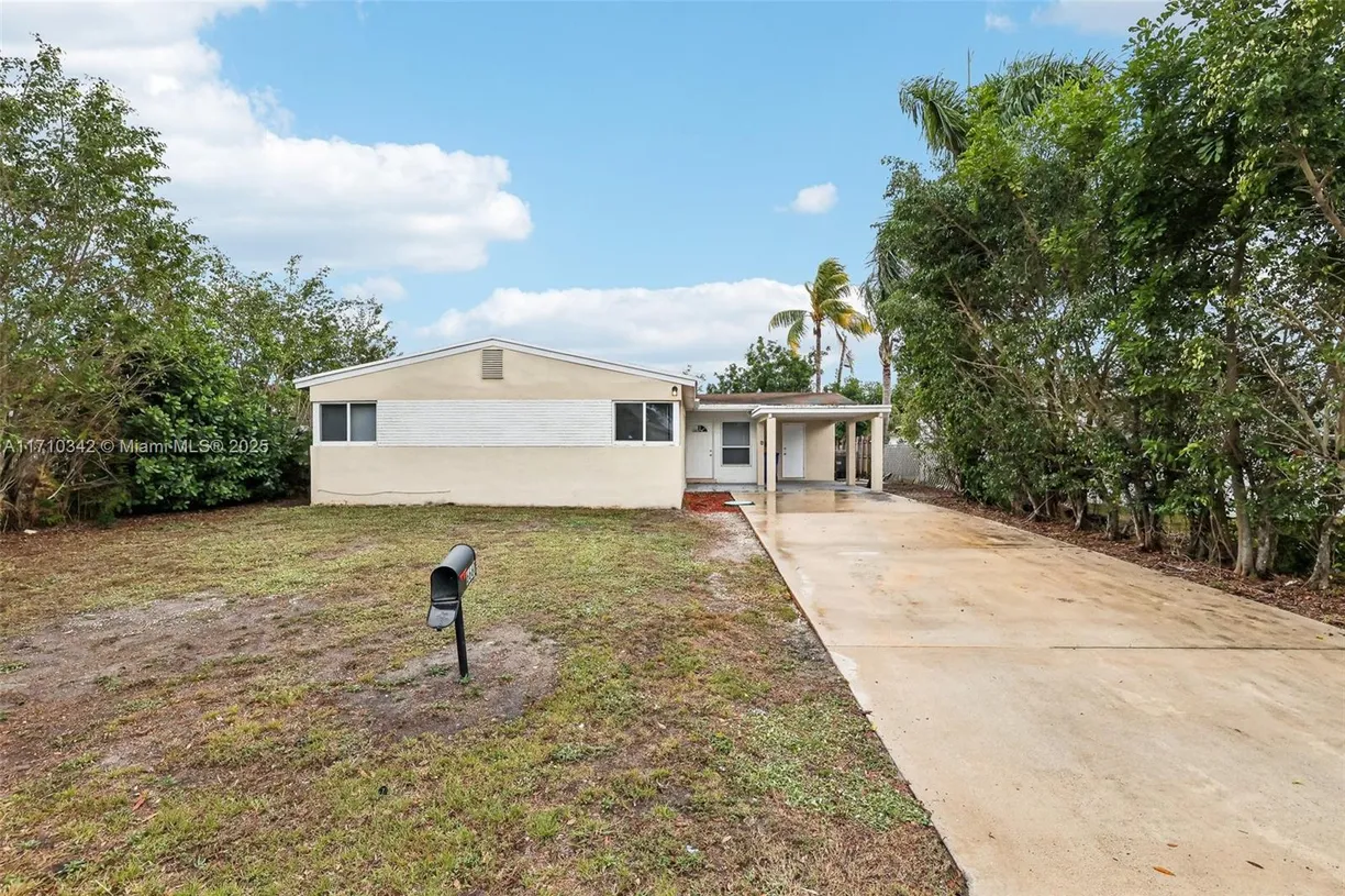 South Florida Real Estate | View 6660 Charleston St | 4 Beds, 2 Baths