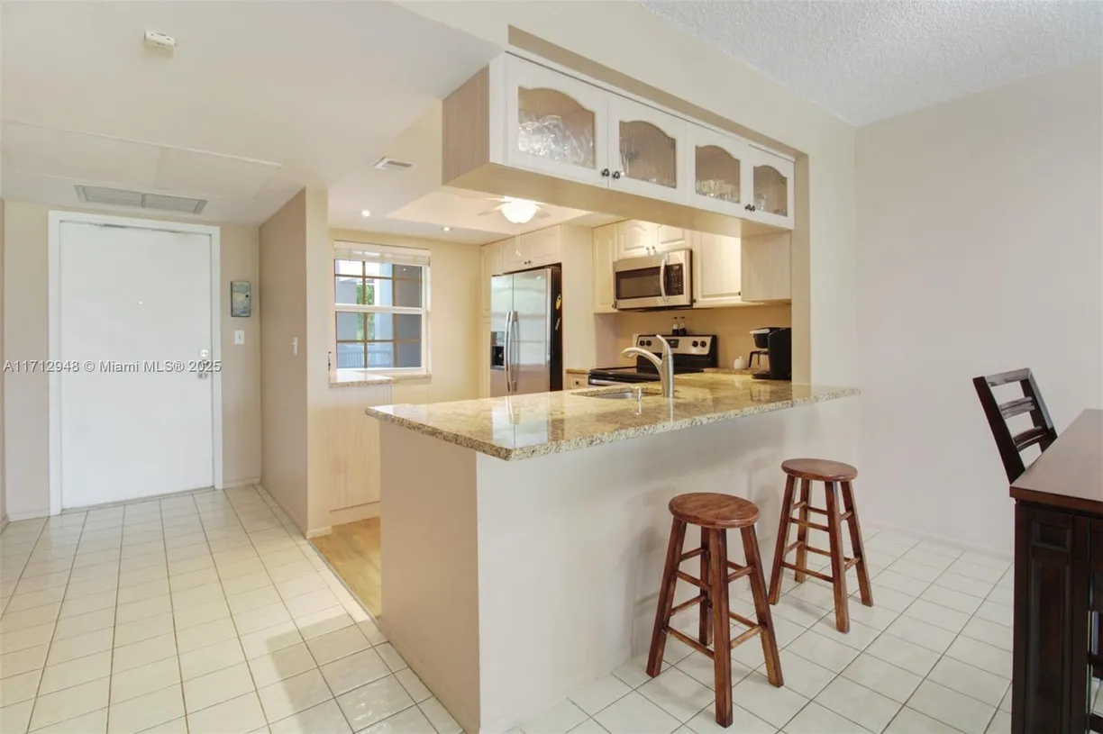 South Florida Real Estate | View 605 Oaks Dr, 305 | 2 Beds, 2 Baths