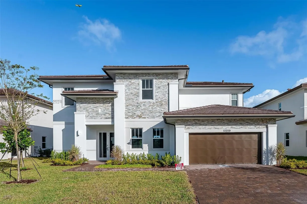 South Florida Real Estate | View 12259 SW 43rd St | 4 Beds, 3 Baths