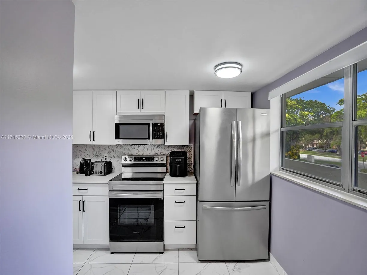 South Florida Real Estate | View 6075 N Sabal Palm Blvd, 212 | Listing