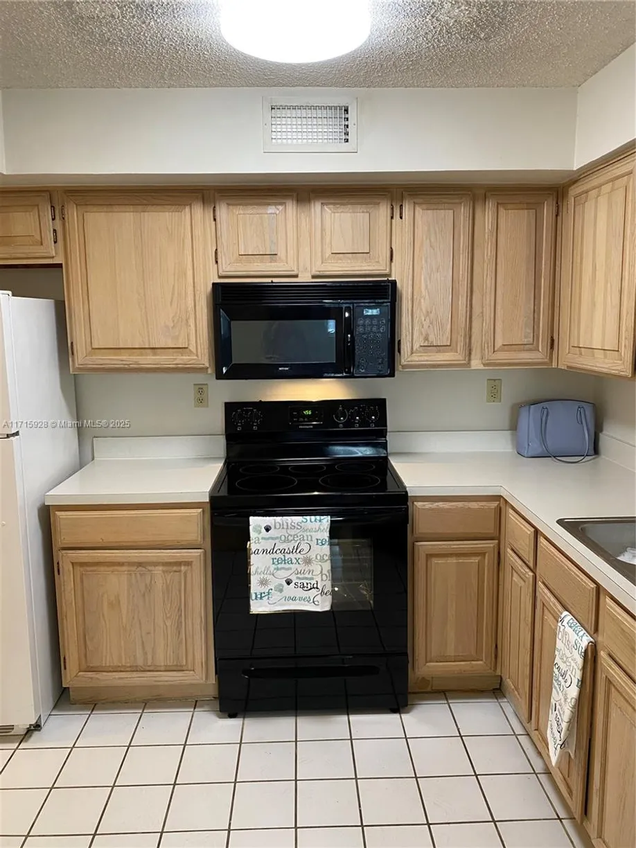 South Florida Real Estate | View 1280 S Alhambra Cir, 1225 | 2 Beds, 2 Baths
