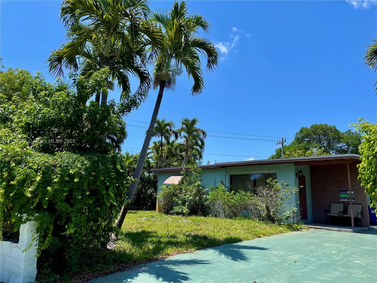 South Florida Real Estate | View 1560 NE 42 St | 3 Beds, 2 Baths