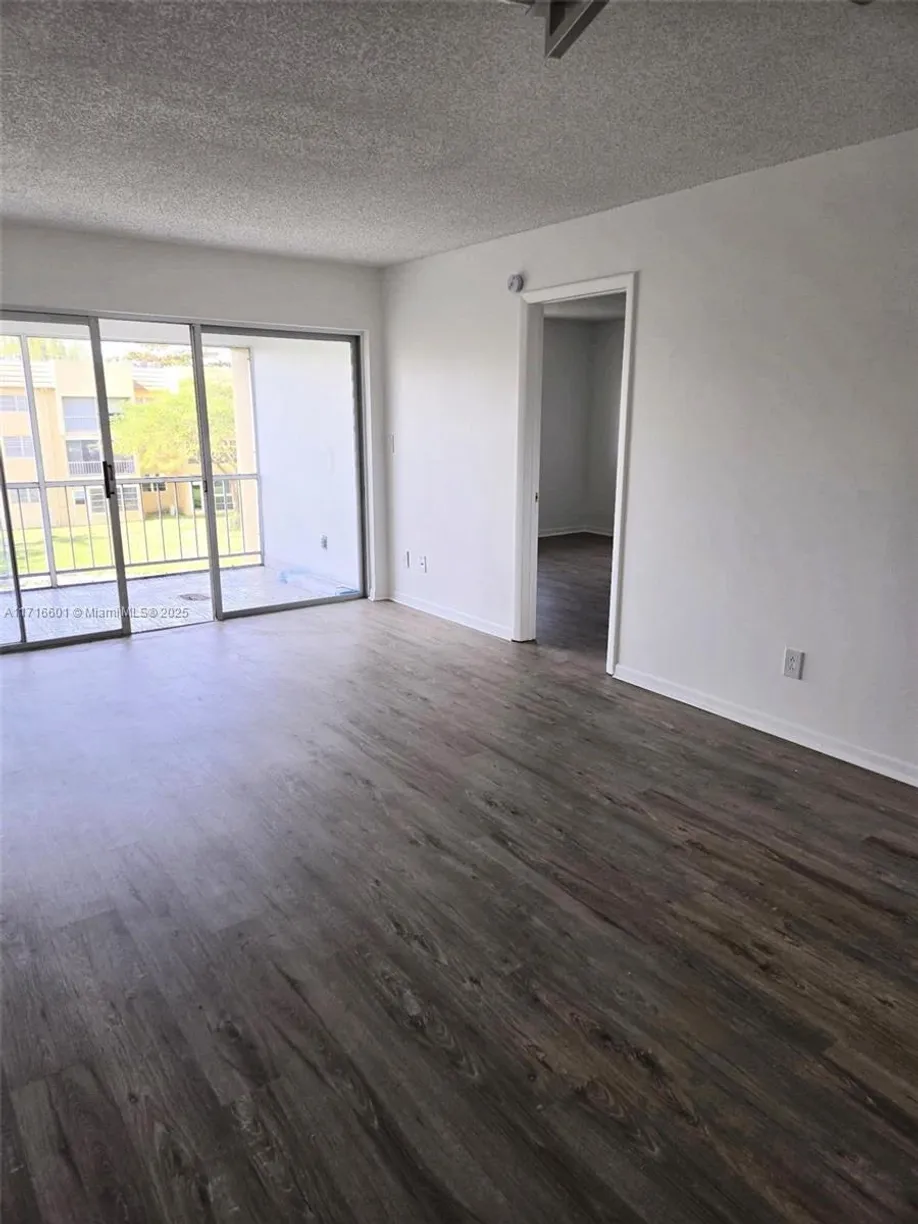 South Florida Real Estate | View 5860 NW 64th Ave, 311 | 2 Beds, 2 Baths