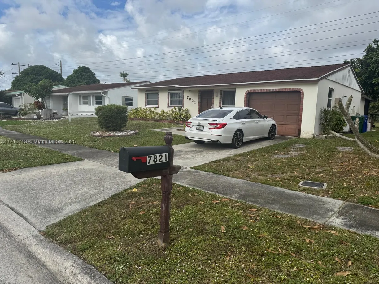 South Florida Real Estate | View 7821 SW 1st St | 4 Beds, 2 Baths