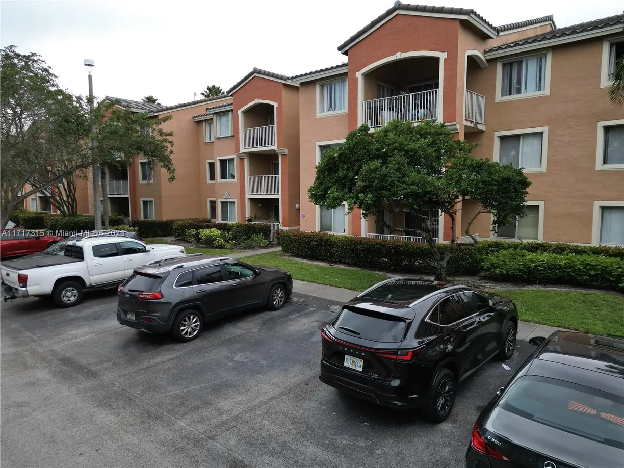 South Florida Real Estate | View 3844 Lyons Rd, 112-4 | 3 Beds, 2 Baths