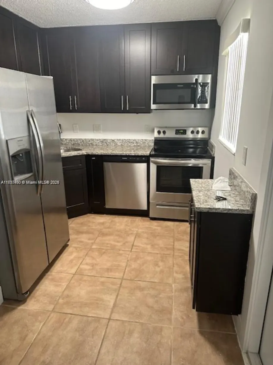 South Florida Real Estate | View 305 NE 16th St, 3 | 2 Beds, 1 Bath
