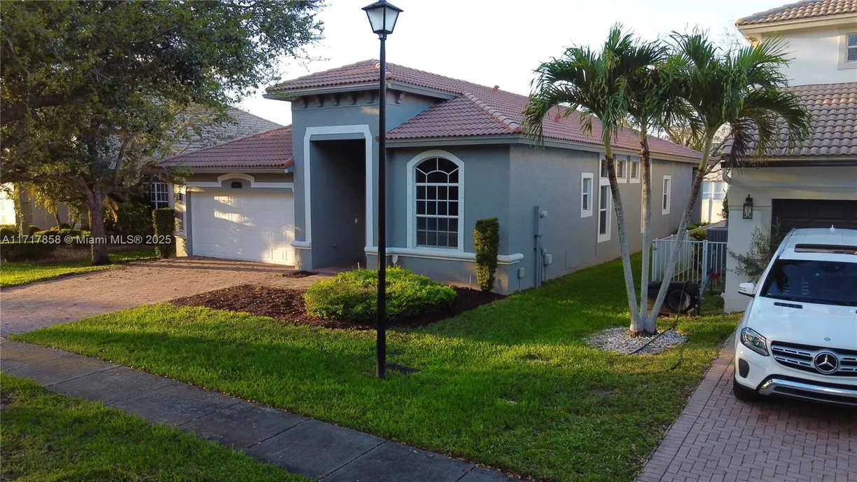South Florida Real Estate | View 14911 SW 52nd St | 4 Beds, 3 Baths