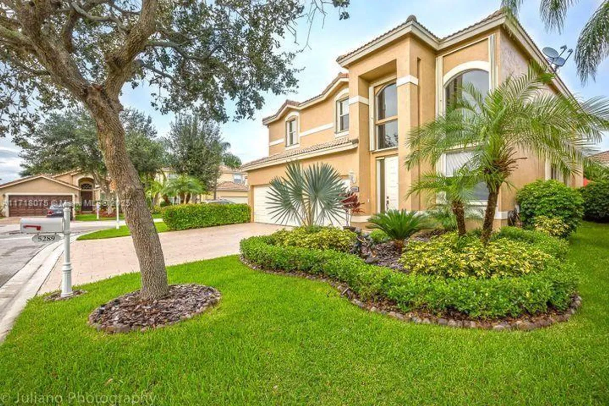 South Florida Real Estate | View 5289 NW 112th Way | 5 Beds, 3 Baths