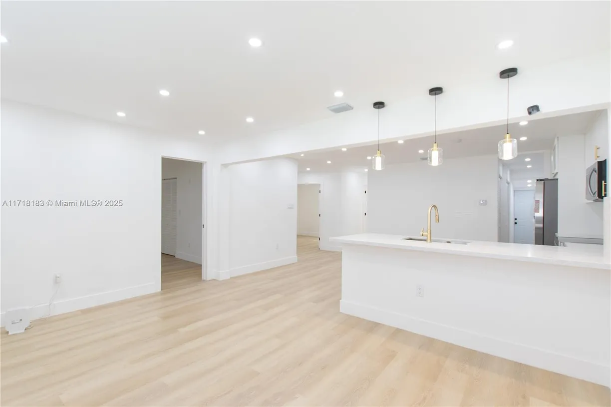 South Florida Real Estate | View 2020 NW 2nd St | 4 Beds, 3 Baths