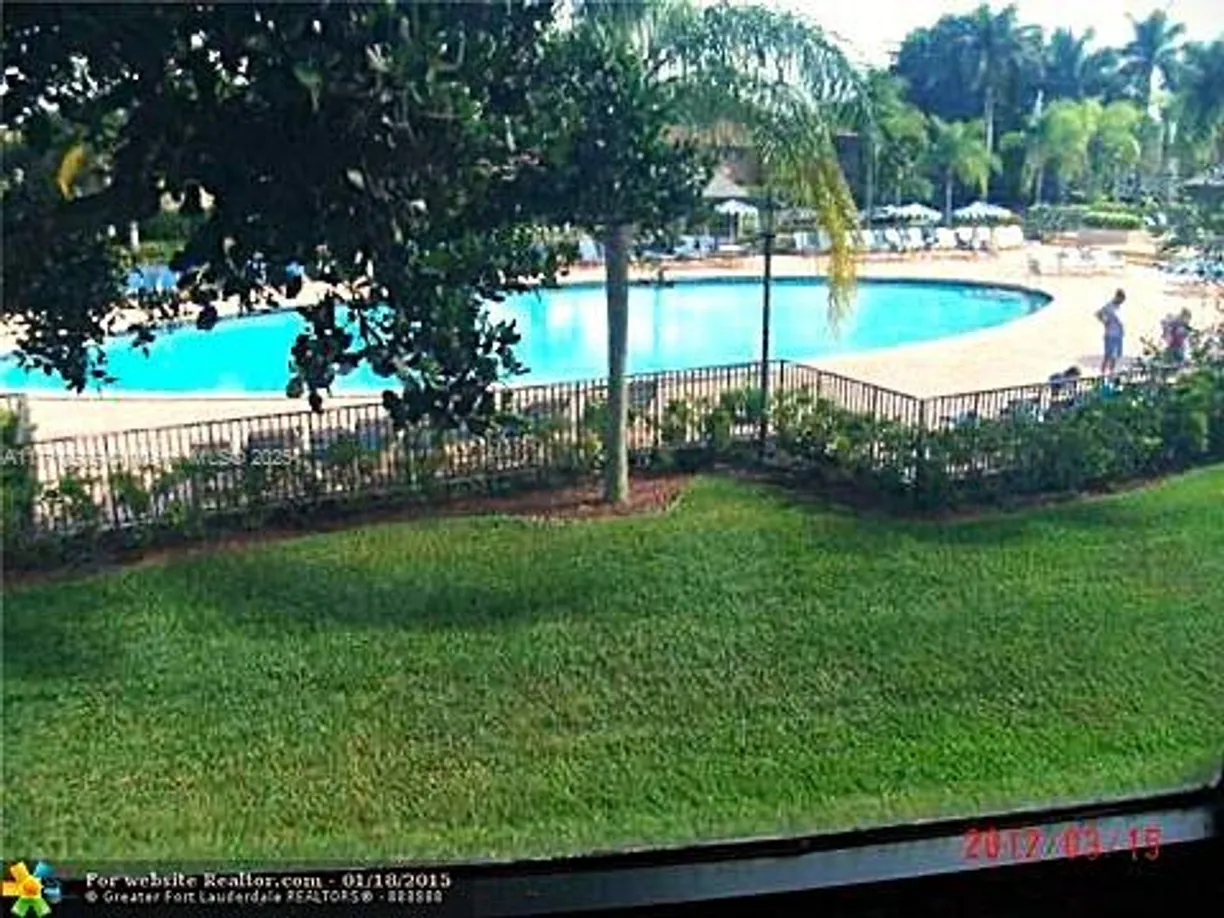 South Florida Real Estate | View 10641 W Clairmont Cir, 203 | 2 Beds, 2 Baths