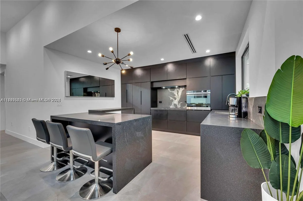 South Florida Real Estate | View 155 NW 51st St | 5 Beds, 2 Baths