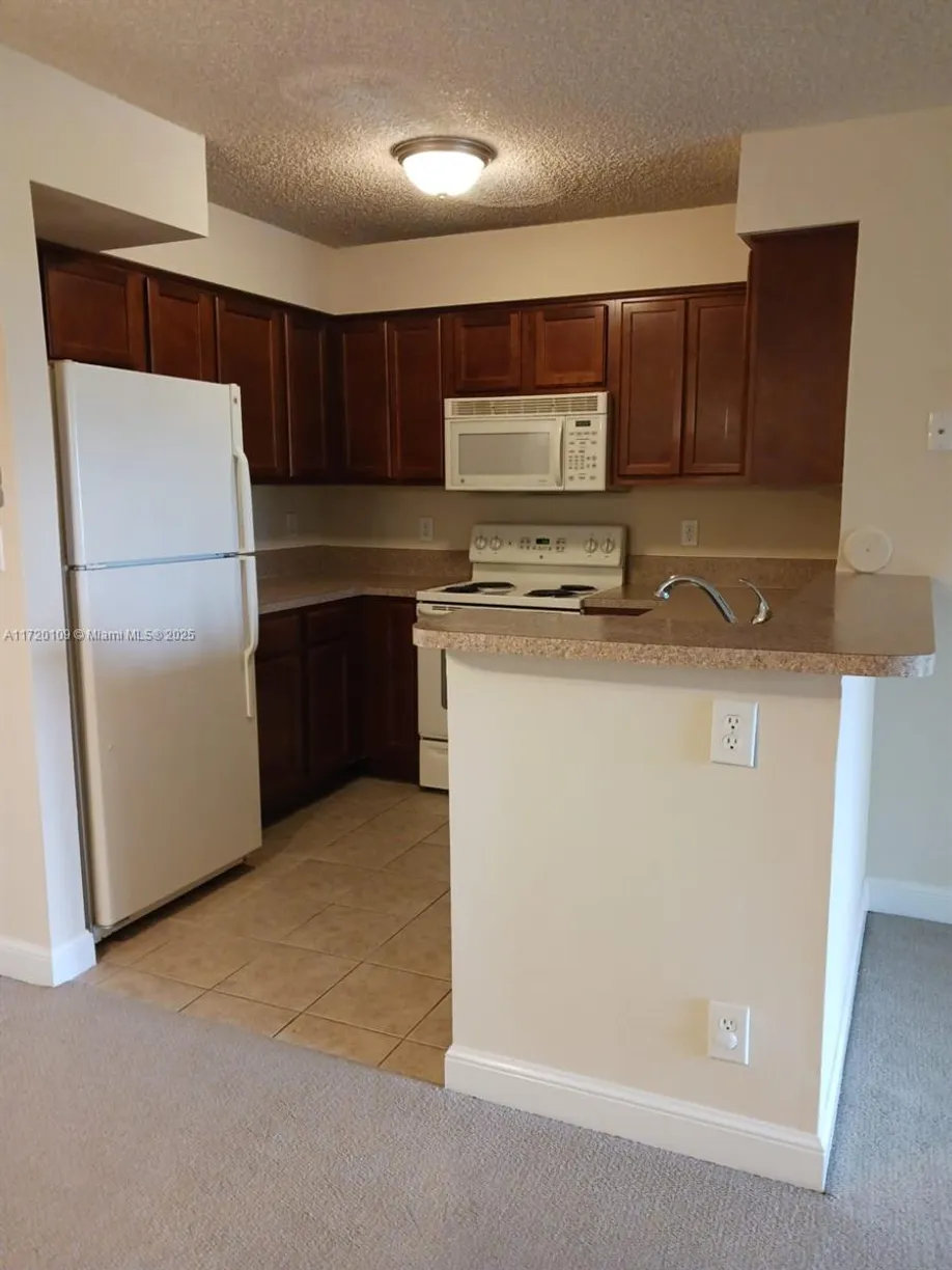 South Florida Real Estate | View 7630 Westwood Dr, 305 | Listing