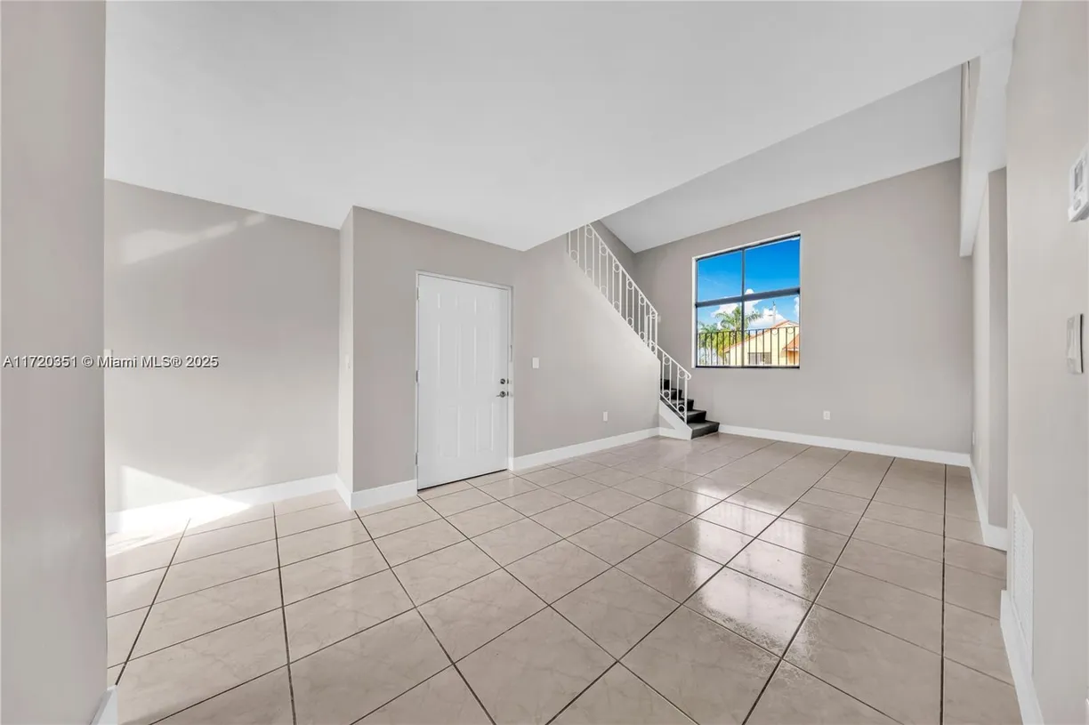South Florida Real Estate | View 2770 W 60th Place, 201 | 3 Beds, 2 Baths