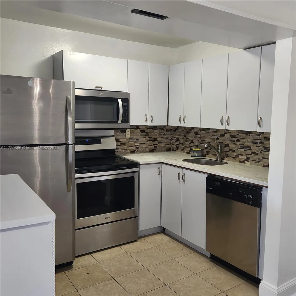 South Florida Real Estate | View 1400 NE 54th St, 106 | 1 Bed, 1 Bath