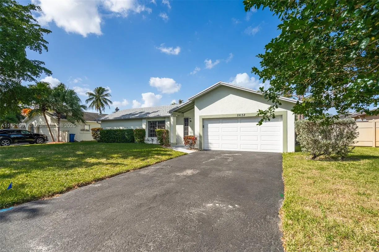 South Florida Real Estate | View 2638 NW 98 Way | 4 Beds, 2 Baths