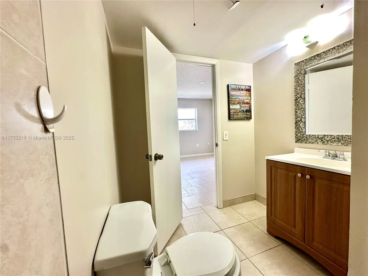 South Florida Real Estate | View 8500 Sunrise Lakes Blvd, 303 | Listing