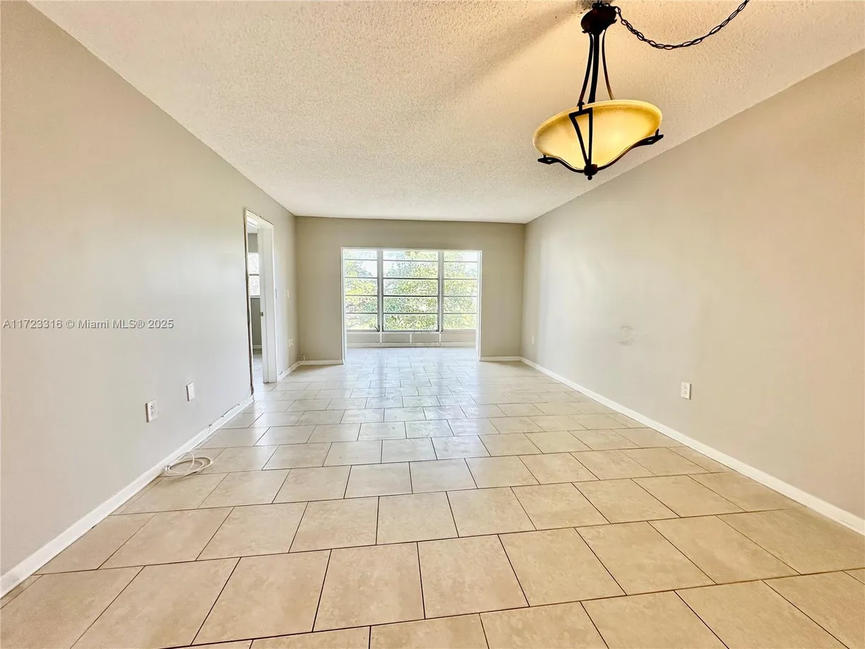 South Florida Real Estate | View 8500 Sunrise Lakes Blvd, 303 | Listing
