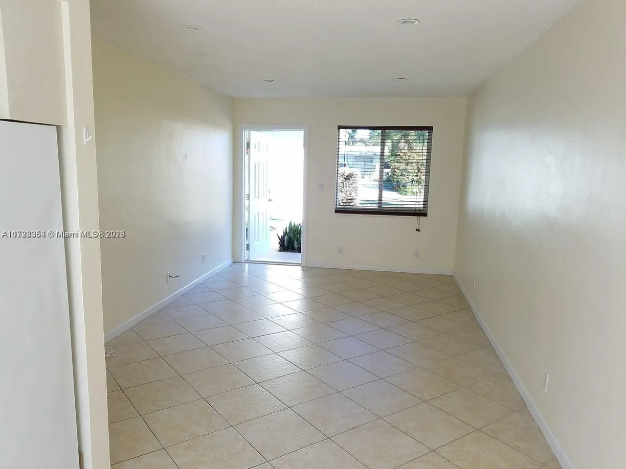 South Florida Real Estate | View 1231 NE 23rd Ave | Listing