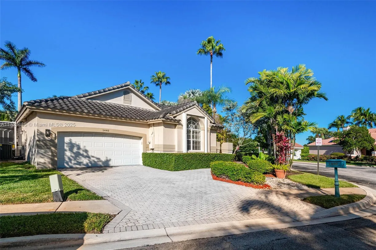 South Florida Real Estate | View 1440 W Lacosta Dr W, 1440 | 4 Beds, 2 Baths