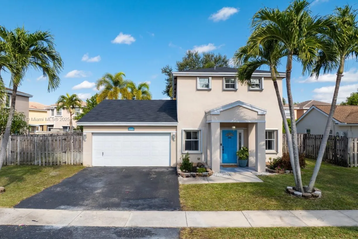 South Florida Real Estate | View 9509 NW 53rd St | 3 Beds, 2 Baths