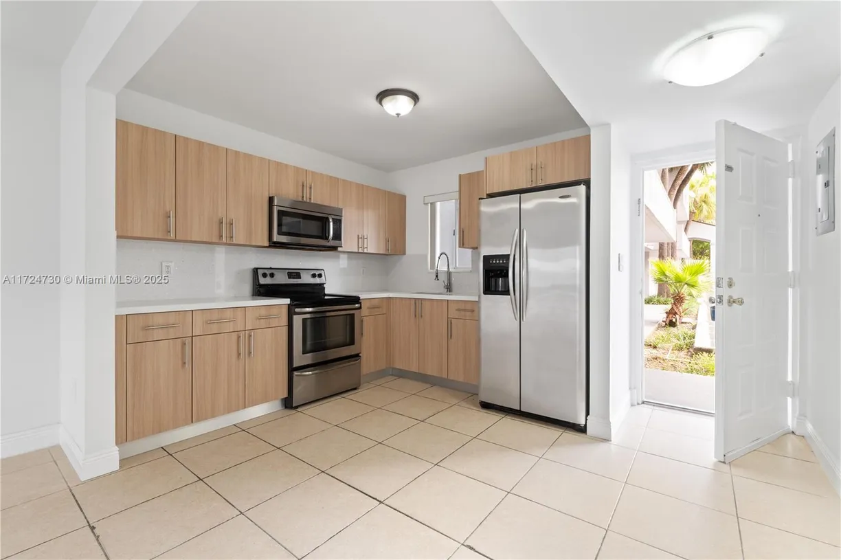 South Florida Real Estate | View 2660 W 76th St, 106 | 2 Beds, 1 Bath