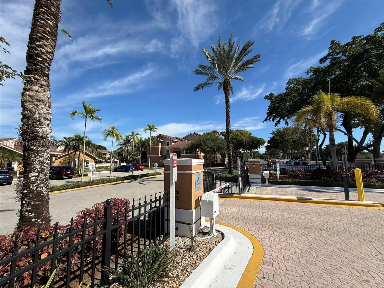 South Florida Real Estate | View 8821 Wiles Rd, 103 | 2 Beds, 2 Baths