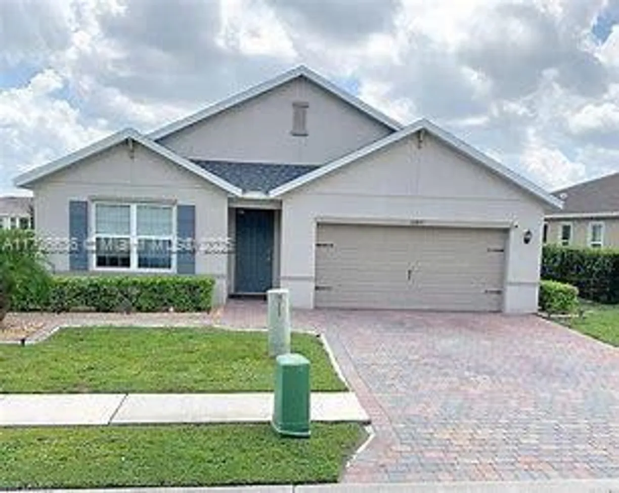 South Florida Real Estate | View 10817 Marble Brook Blvd | 4 Beds, 2 Baths