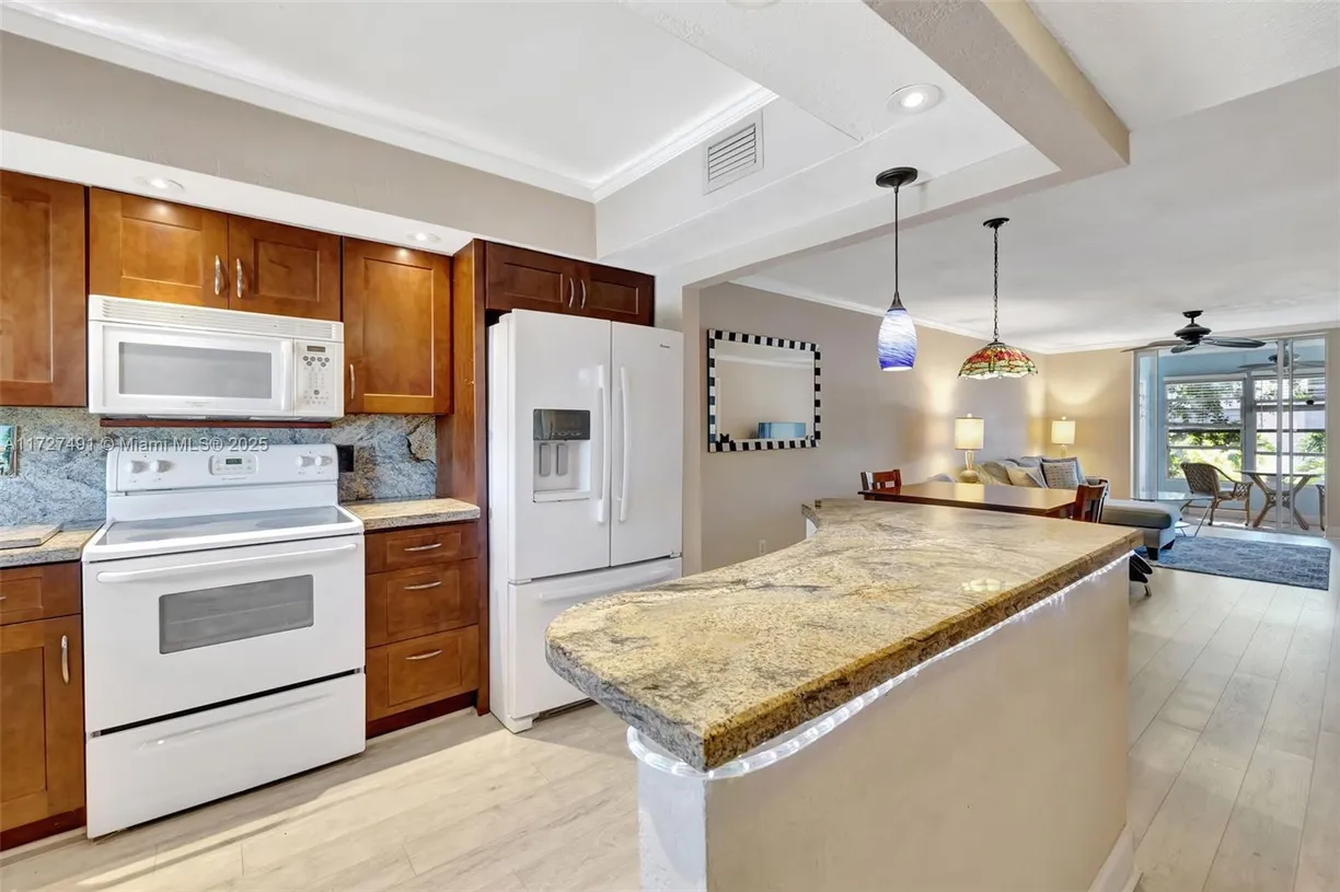 South Florida Real Estate | View 700 SE 6th Ave, 203 | Listing