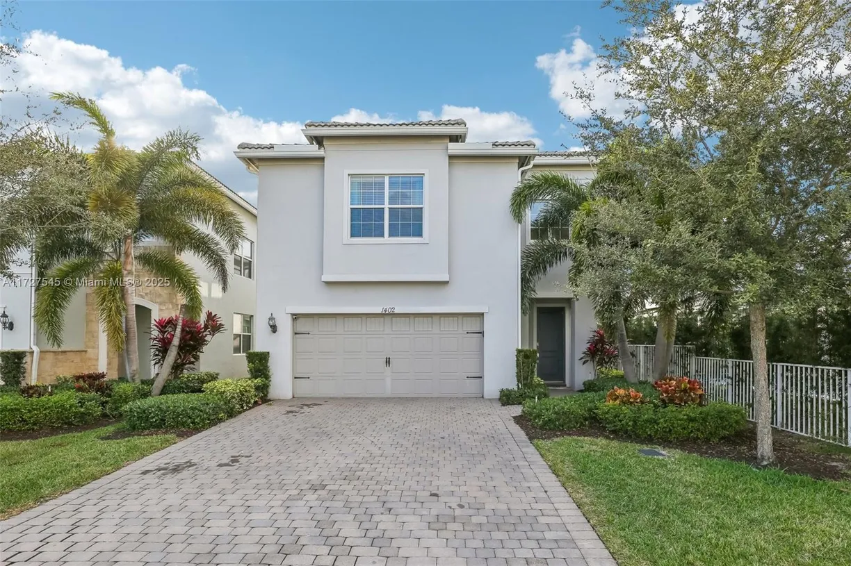 South Florida Real Estate | View 1402 Myrtle Oak Ter | 4 Beds, 2 Baths